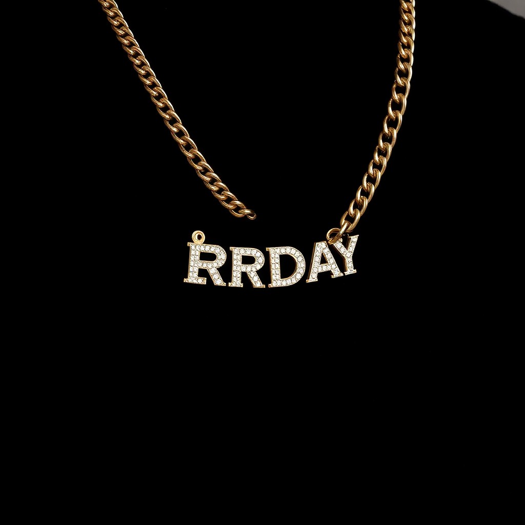 a cuban chain with diamond necklace "ERRDAY" on a black velour fabric in the back
ONLY THE CHAIN